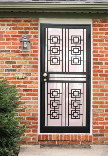black security door on brick house