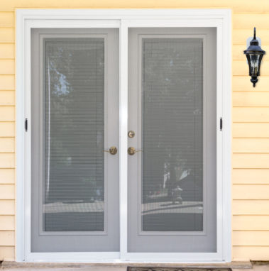 double white patio doors with screens
