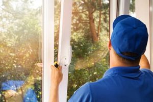 a person doing window installation towson