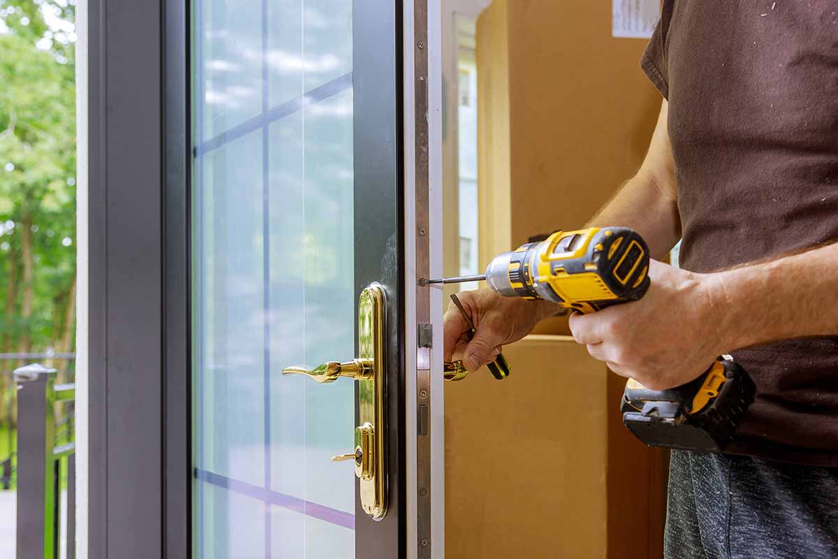 When is it Time to Replace Patio Doors man replaces patio doors