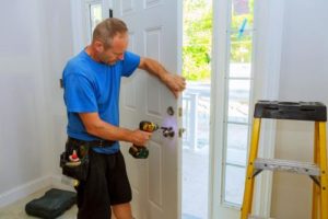 man installs door in baltimore