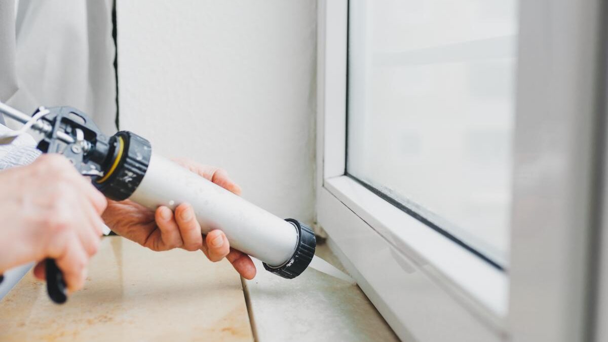 a person installs vinyl windows after learning how long do vinyl windows last