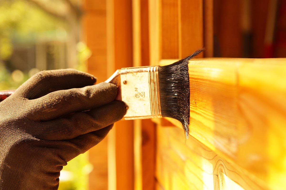 Can I Use Stain on My Fiberglass Entry Door_ a brush applies fiberglass door stain