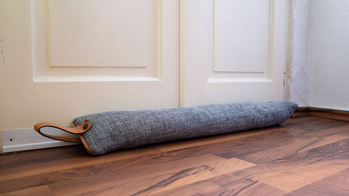 a picture of a door jam to fix a drafty door