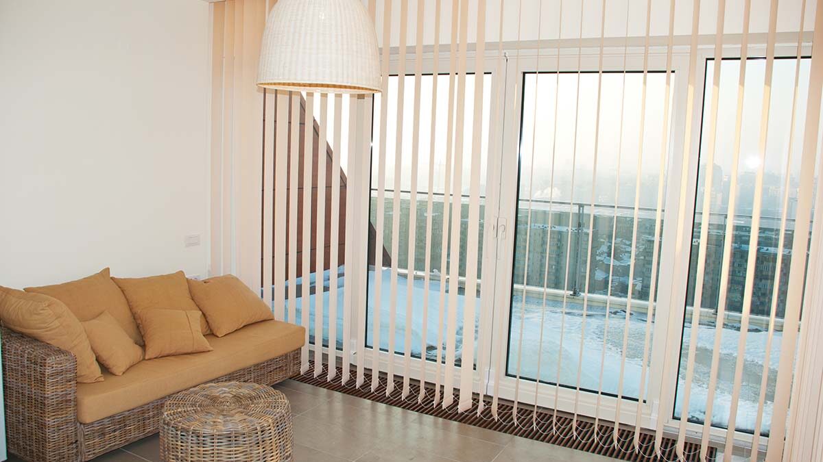 Finding the Right Blinds for Sliding Patio Doors A room using blinds for sliding patio doors