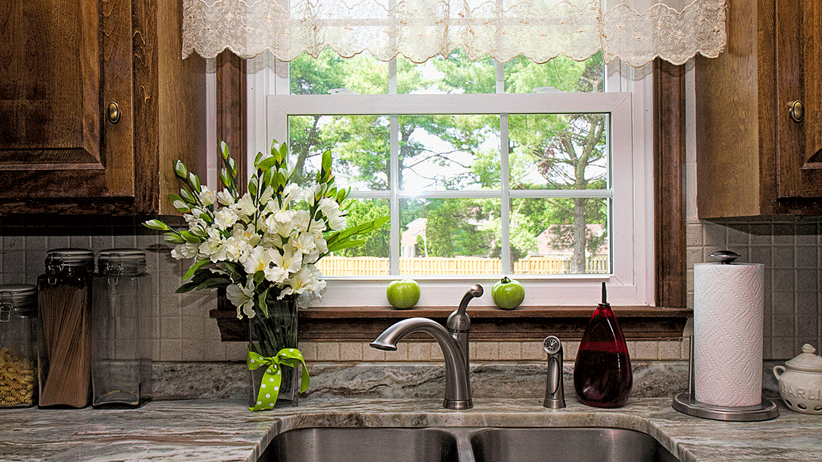 a picture of a window above a kitchen sink, to demonstrate what are garden windows