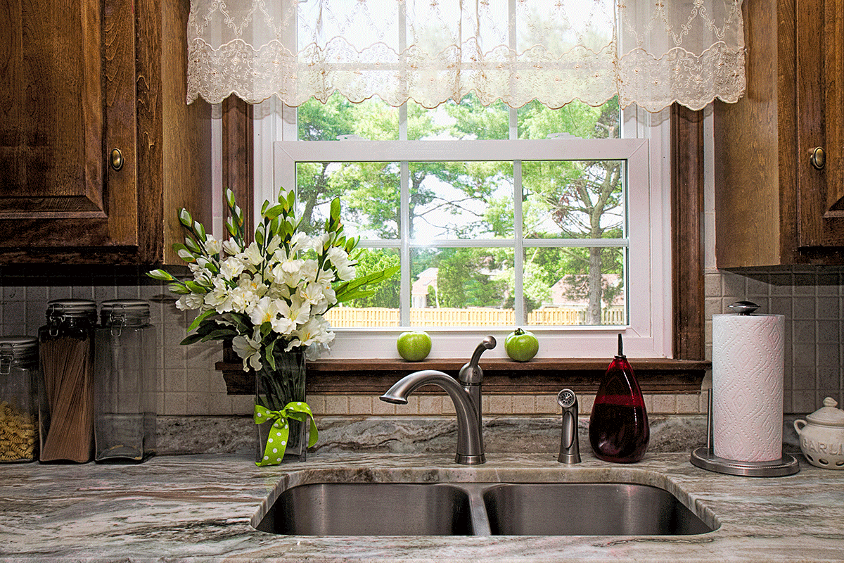 What-are-Garden-Windows a picture of a window above a kitchen sink, to demonstrate what are garden windows