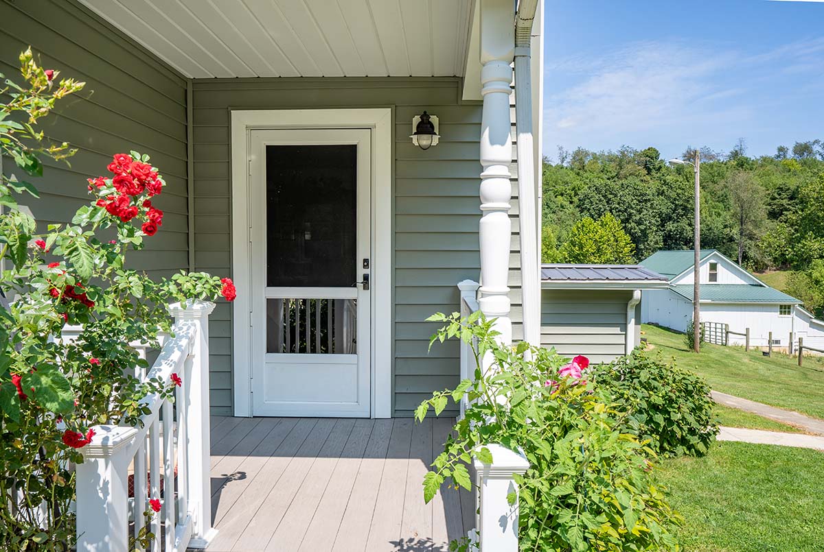 What’s The Cost of Energy Efficient Storm Doors front facade of home with energy efficient storm door