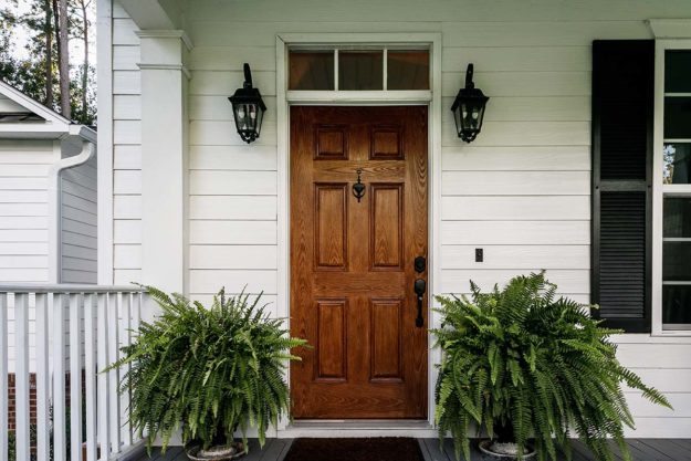 4 Types of Doors for Your Home Brown exterior door, one option of a door type for. your home