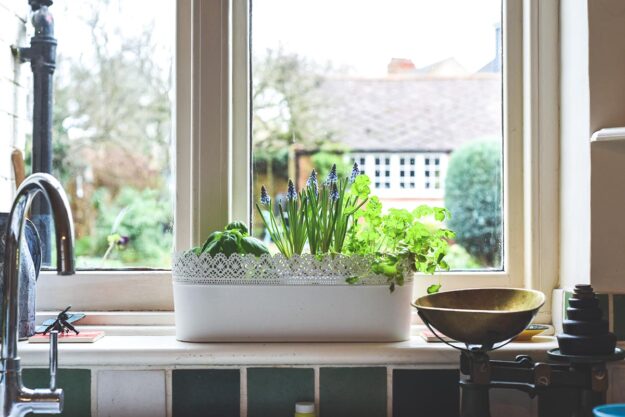 5 Kitchen Garden Window Decorating Ideas interior view of a decorated kitchen garden window
