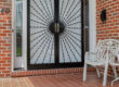 Double front door with decorative storm door