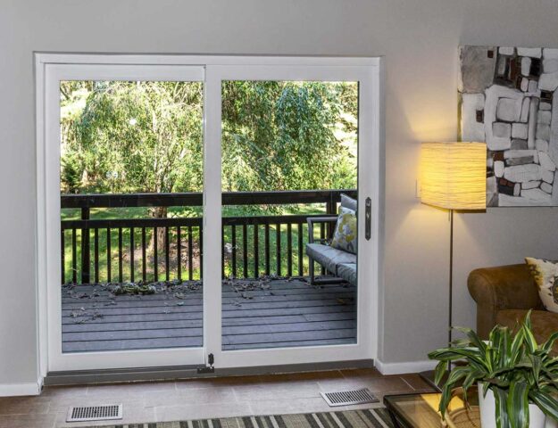 How Much Does Patio Door Replacement Cost newly replaced professionally installed patio doors in a residence