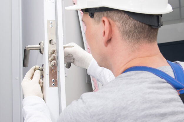 When is it time for a front door replacement a professional installs a new steel entry door