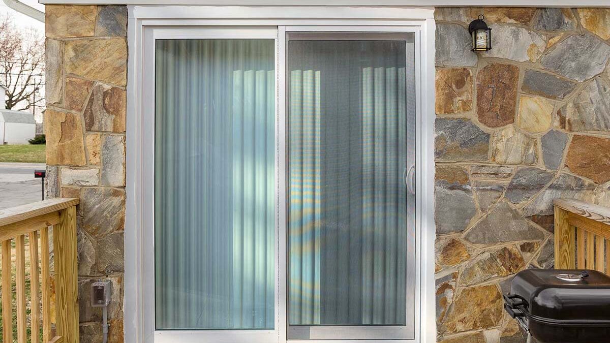 a homeowner has had a sliding glass patio door installed