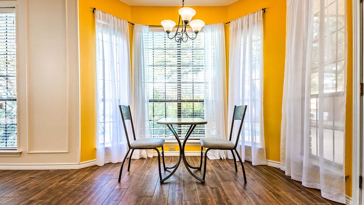 a kitchen bay window brightens up a breakfast nook