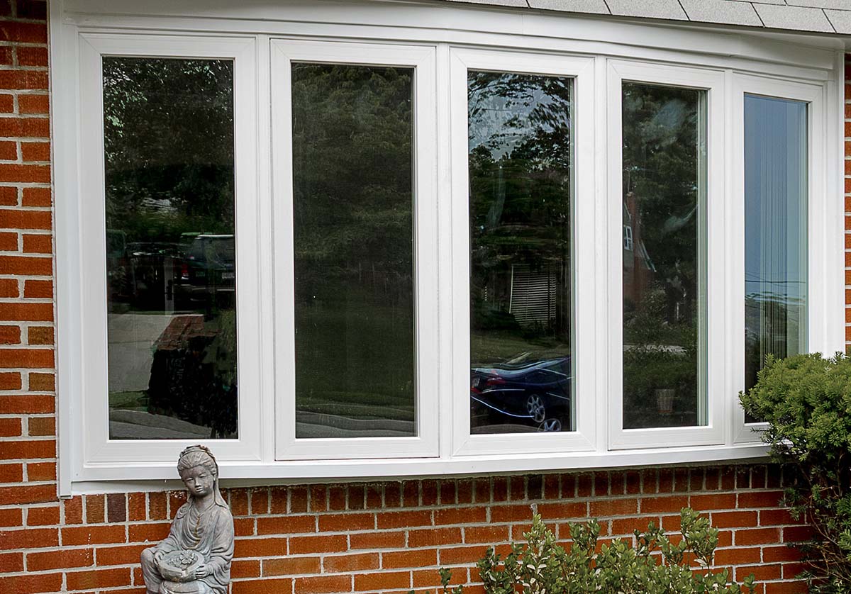 What Are The Benefits of Bow Windows exterior view of newly installed bow windows