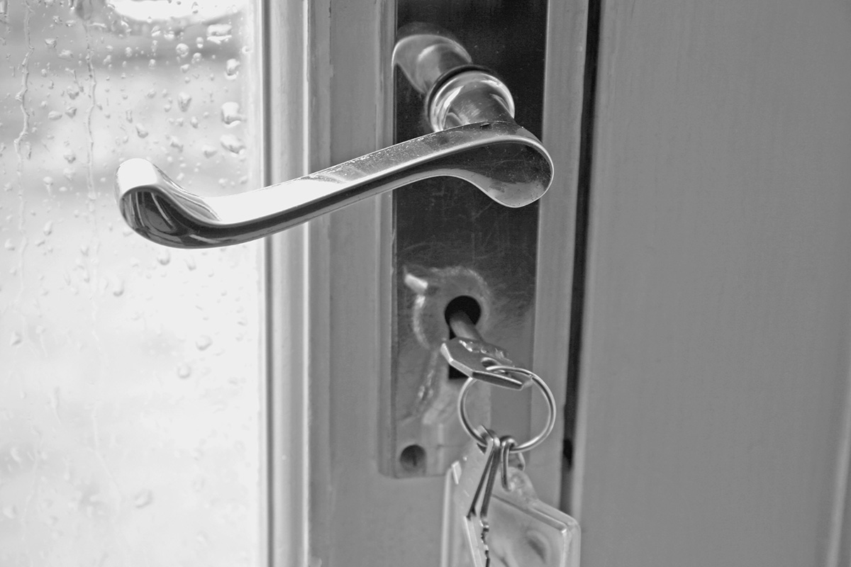 keys in the lock of a new security door