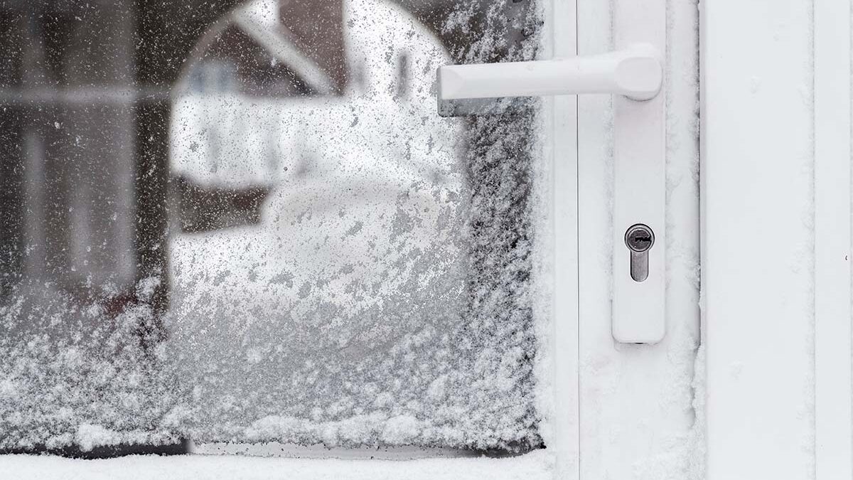 a weather sealed front and storm door in the snow