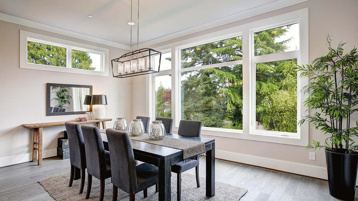 interior of a dining room shows off newly installed impact resistant windows