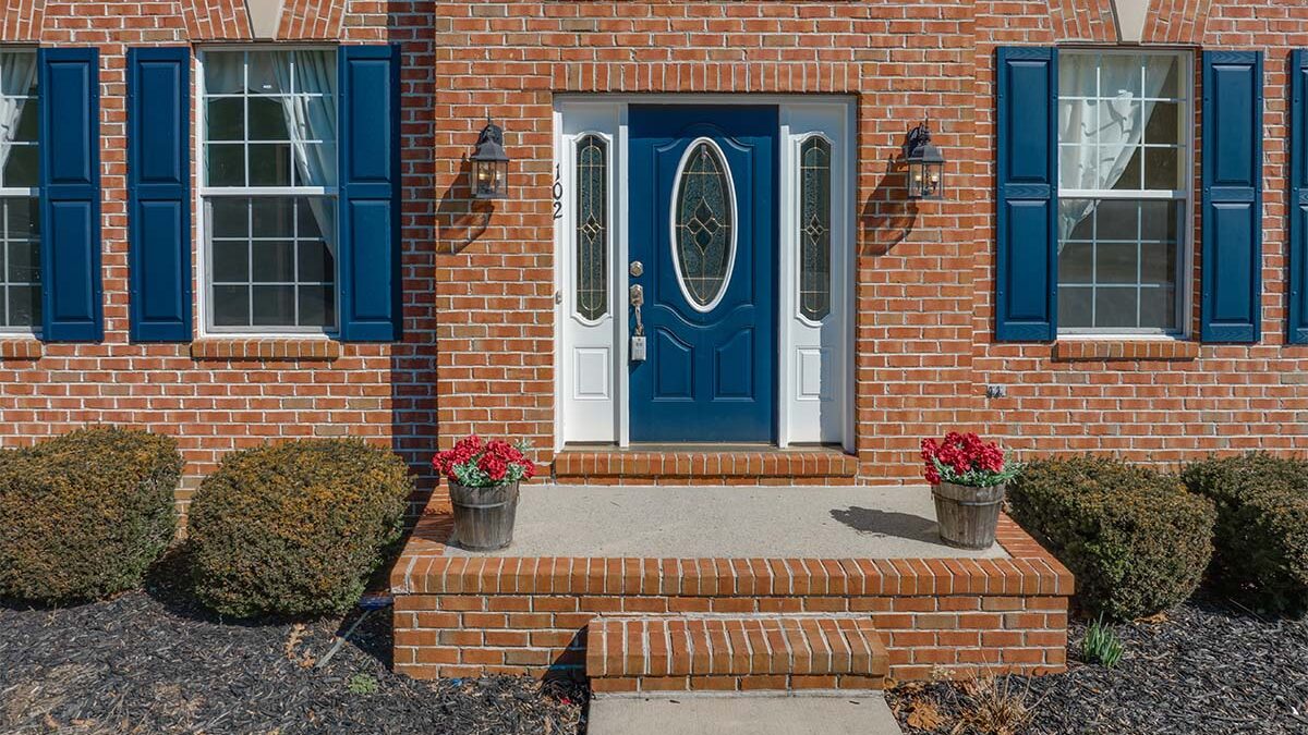 a newly installed fiberglass entry door on a home