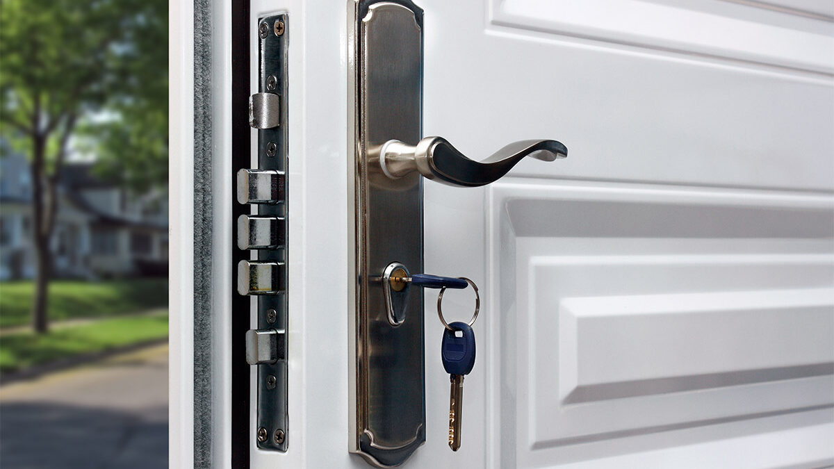 Benefits Of Installing A Security Door For Your Home newly installed security door hardware and key
