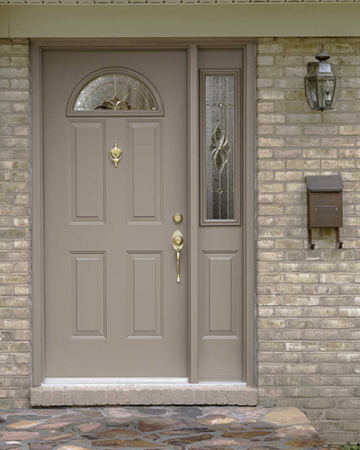 718-Brownstone-w,hse-724s-l,,sfw beige satin finish door on a beige brick house
