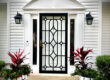 Example of a storm door with gold hardware