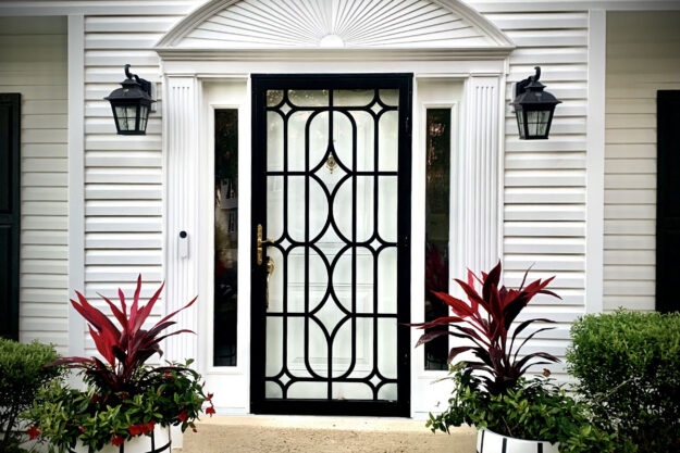 Example of a storm door with gold hardware